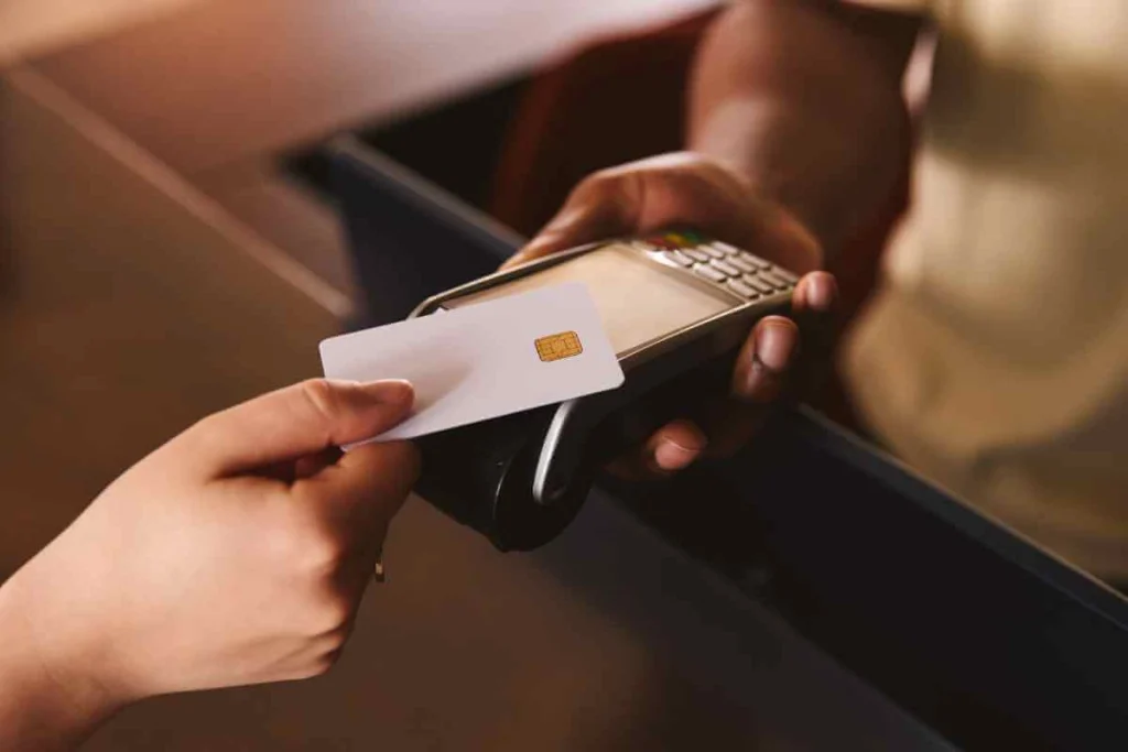 Woman comparing different POS machine prices in Nigeria