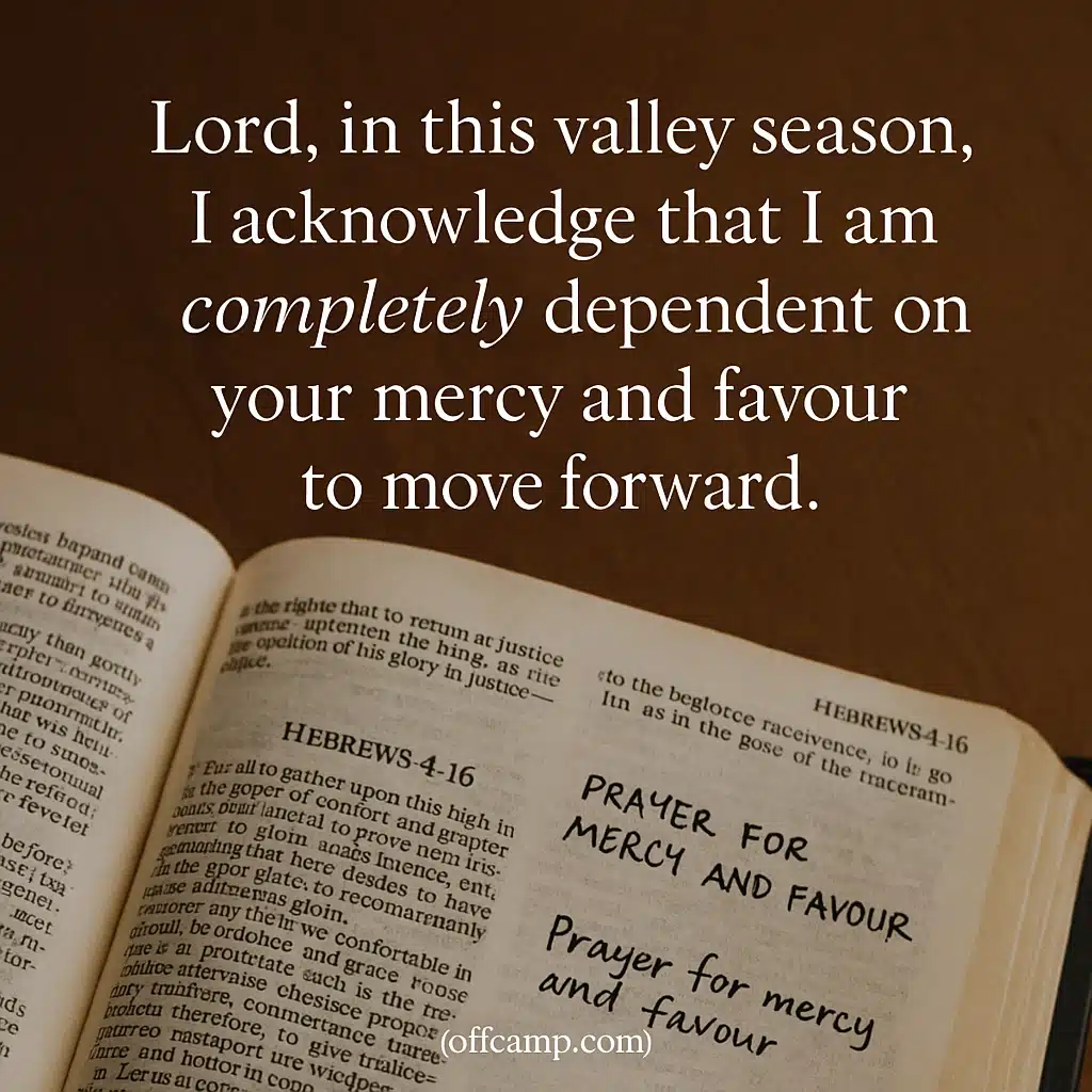 Bible opened to Hebrews 4:16 with prayer for mercy and favour handwritten nearby